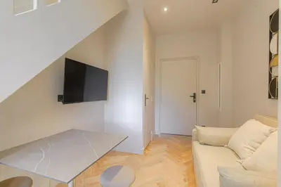 Télévision ou salle de divertissement dans l'établissement Appartement cosy et lumineux, Ecully