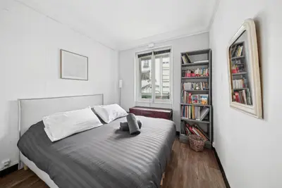 Un ou plusieurs lits dans un hébergement de l'établissement Magnifique appartement au cœur du 6ème