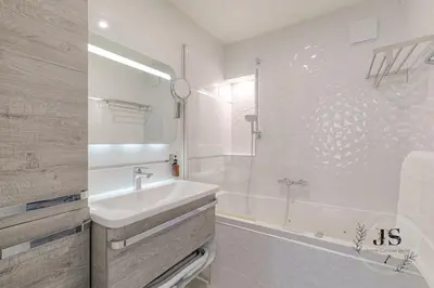 Salle de bains dans l'établissement L'Escapade Stadium - T4 familial climatisé