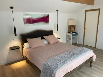 Un ou plusieurs lits dans un hébergement de l'établissement Studio indépendant dans propriété au cœur du Beaujolais