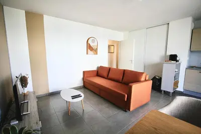 Coin salon dans l'établissement Appartement proche grands axes - parking privé
