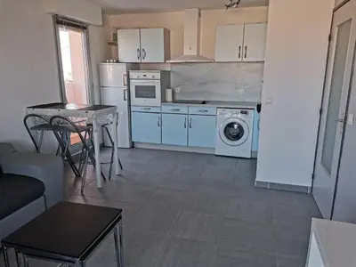 Cuisine ou kitchenette dans l'établissement Appartement T2 Marina