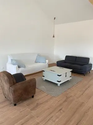 Coin salon dans l'établissement Java Family home for weekends with friends