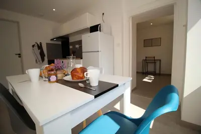 Télévision ou salle de divertissement dans l'établissement Gîte de la Serve La Balme-les-Grottes