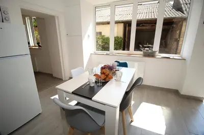 Cuisine ou kitchenette dans l'établissement Gîte de la Serve La Balme-les-Grottes