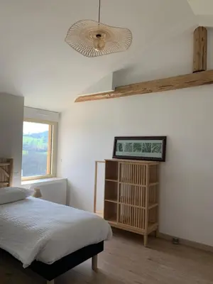 Un ou plusieurs lits dans un hébergement de l'établissement Gîte Belle Vue à Savigny proche de Lyon