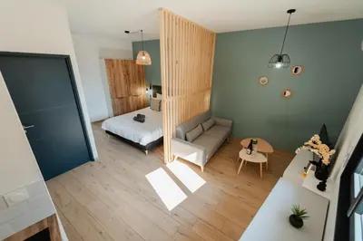 Un ou plusieurs lits dans un hébergement de l'établissement Vina Rhona - Loft de charme entre Rhône et Vignes