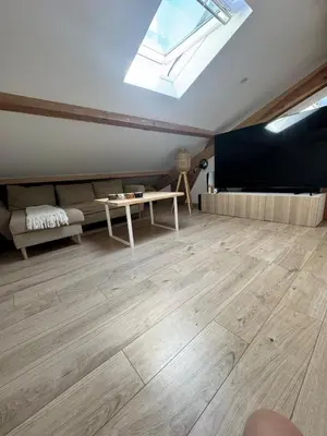 Coin salon dans l'établissement Cozy apartment