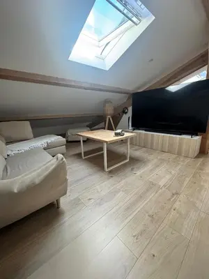 Un ou plusieurs lits dans un hébergement de l'établissement Cozy apartment