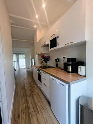 Cuisine ou kitchenette dans l'établissement Studio RDC proche aéroport