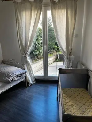 Un ou plusieurs lits dans un hébergement de l'établissement Villeurbanne Super Apartment in residence