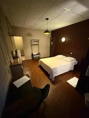 Un ou plusieurs lits dans un hébergement de l'établissement Hôtel d'Enghien