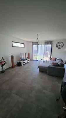 Coin salon dans l'établissement Chambre spacieuse #2