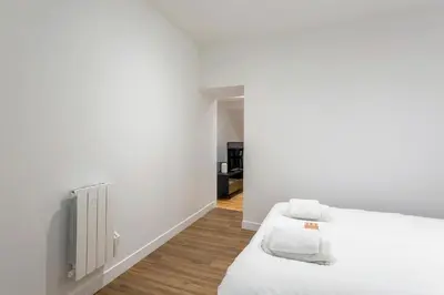 Un ou plusieurs lits dans un hébergement de l'établissement Le Belvédère - Coeur de Lyon 5ème - wifi inclus