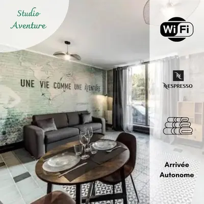 Coin salon dans l'établissement Studio AVENTURE - Le Méridien #Lave-vaisselle #Wifi #Ventilateur