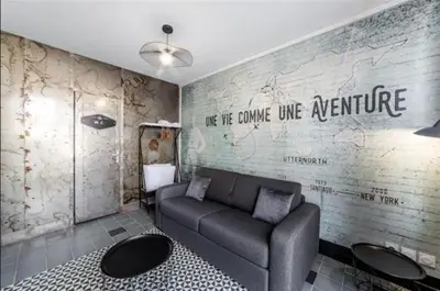 Coin salon dans l'établissement Studio AVENTURE - Le Méridien #Lave-vaisselle #Wifi #Ventilateur