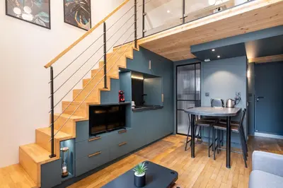 Cuisine ou kitchenette dans l'établissement Évasion urbaine loft avec spa et balcon côté Opéra