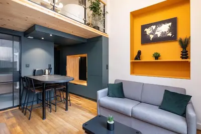 Cuisine ou kitchenette dans l'établissement Évasion urbaine loft avec spa et balcon côté Opéra