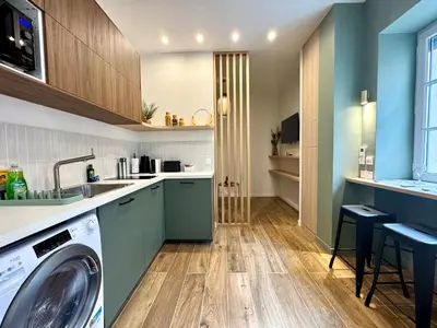 Cuisine ou kitchenette dans l'établissement L'Écrin de Duguesclin Comfort & Charm in Lyon 3rd arrondissement