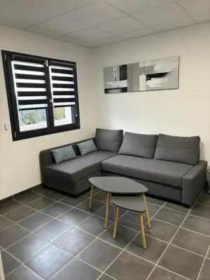 Coin salon dans l'établissement Studio proche Vienne 38200