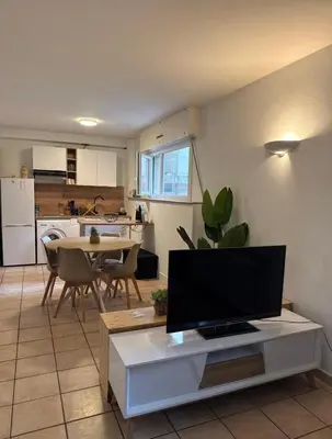 Cuisine ou kitchenette dans l'établissement Le cosy Cusset