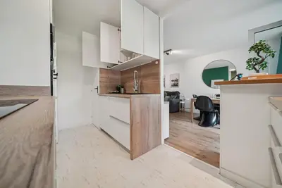 Cuisine ou kitchenette dans l'établissement Superbe appartement avec terrasse cosy & spacieux - Lyon 3