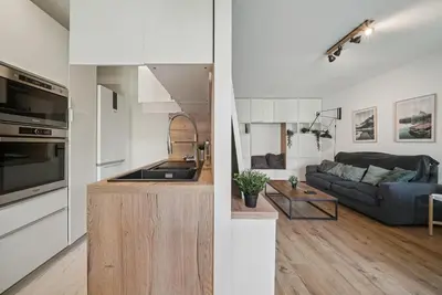 Cuisine ou kitchenette dans l'établissement Superbe appartement avec terrasse cosy & spacieux - Lyon 3
