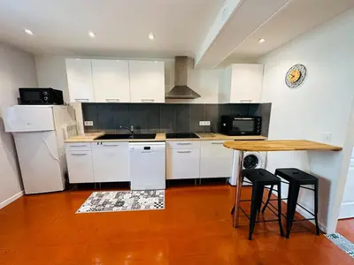 Cuisine ou kitchenette dans l'établissement Chez Auguste - charmant studio 3 étoiles