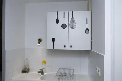 Cuisine ou kitchenette dans l'établissement Appartement T2 Confortable à Lyon