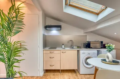 Cuisine ou kitchenette dans l'établissement Le Petit Tolstoï - Appart cosy 2pers
