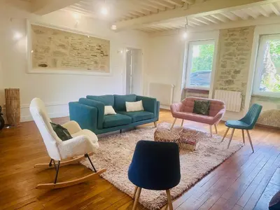 Coin salon dans l'établissement Superbe maison en pierre