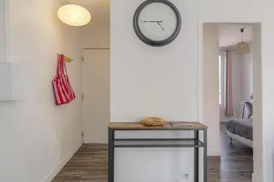 Un ou plusieurs lits dans un hébergement de l'établissement Le Pipet - T2 avec terrasse, vue, à deux pas du théâtre antique
