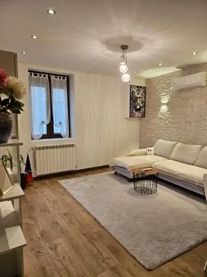 Coin salon dans l'établissement Spacious & Cozy - 3 Bedrooms