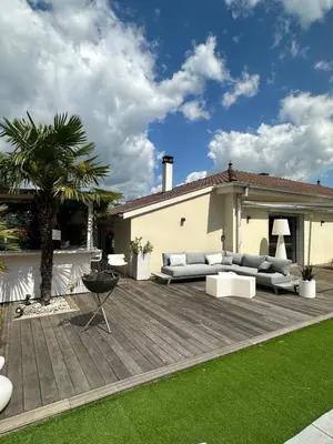 Coin salon dans l'établissement Villa familiale à 20 mn de Lyon