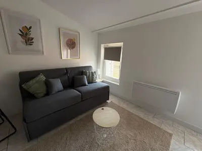Coin salon dans l'établissement Studio le cocon aux portes de Lyon