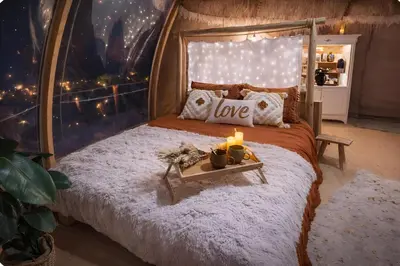 Un ou plusieurs lits dans un hébergement de l'établissement BOHO LODGE - Nuit insolite - Romantique & Spa