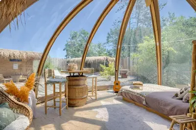 Un ou plusieurs lits dans un hébergement de l'établissement BOHO LODGE - Nuit insolite - Romantique & Spa