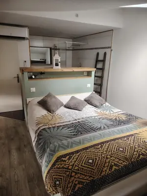 Un ou plusieurs lits dans un hébergement de l'établissement La Casa Beaujolaise