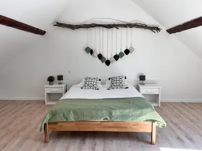 Un ou plusieurs lits dans un hébergement de l'établissement Appartement Ampuis Villa Monplaisir
