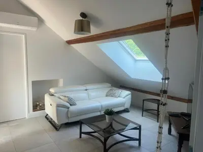 Coin salon dans l'établissement Appartement Ampuis Villa Monplaisir