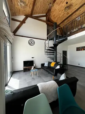 Coin salon dans l'établissement Villa en campagne