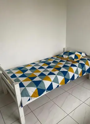 Un ou plusieurs lits dans un hébergement de l'établissement Joli appartement limite Lyon 8, tram T4