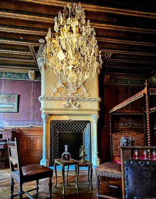 Coin salon dans l'établissement Château Louis XI en Beaujolais