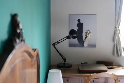 Télévision ou salle de divertissement dans l'établissement La Rose du Petit Bois