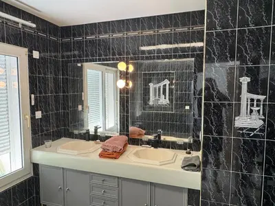 Salle de bains dans l'établissement Le Clos de MANVAL