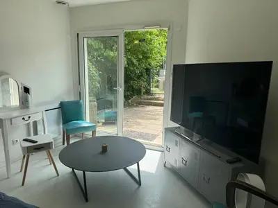 Télévision ou salle de divertissement dans l'établissement Le Clos de MANVAL