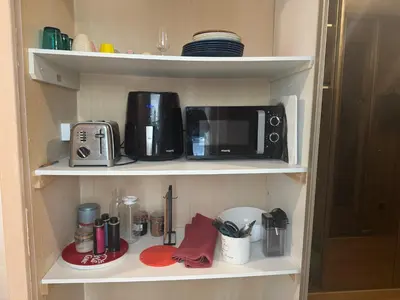 Cuisine ou kitchenette dans l'établissement Le Clos de MANVAL