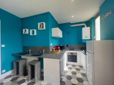 Cuisine ou kitchenette dans l'établissement Le VIP