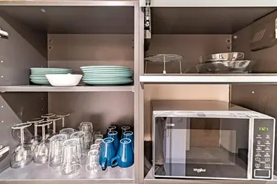 Cuisine ou kitchenette dans l'établissement Cocon moderne Émile Zola