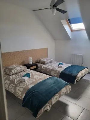 Un ou plusieurs lits dans un hébergement de l'établissement Duplex avec Parking